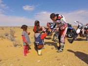Sahara Offroad, Tunisia tour in February 2012: bikers meet nomad children